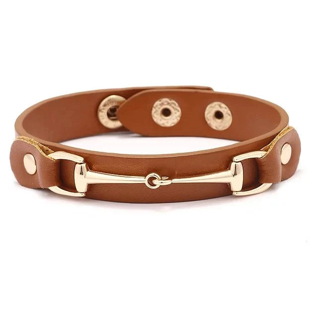 AWST INT'L VEGAN LEATHER BRACELET WITH GOLD TONE SNAFFLE BIT