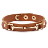 AWST INT'L VEGAN LEATHER BRACELET WITH GOLD TONE SNAFFLE BIT